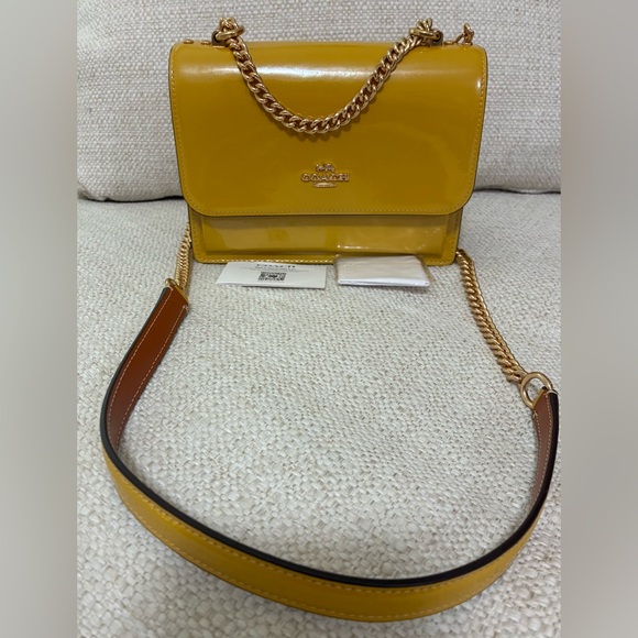 Coach Handbags - Coach NWOT Mustard Yellow Crossbody Bag with hang tag and Care Card